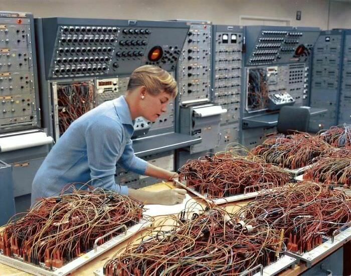 Engineer Karen Leadlay working on the analog computers in the Space Division of General Dynamics, 1964.