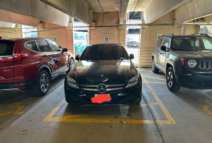 This jerk who parked on the handicap stripes in a hospital parking garage.