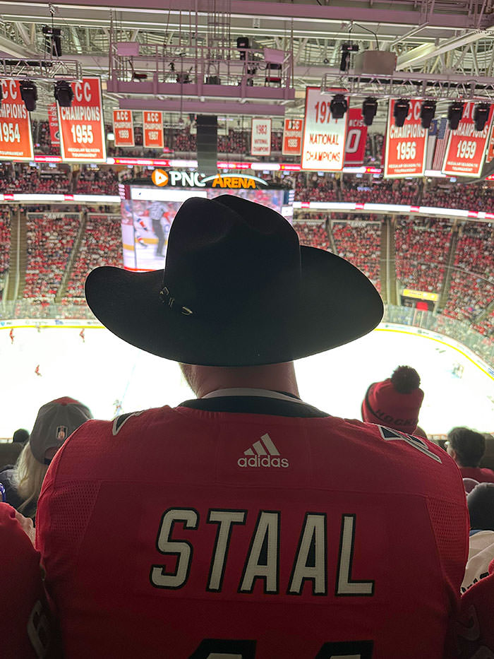 Guy in front of me refused to take off his hat after I told him it was blocking my view.