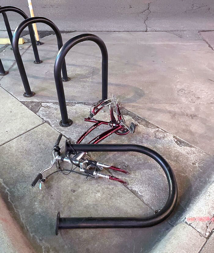 Somebody unbolted the whole bike rack in an attempt to steal my bike. When the lock didn't fit, they just stole the tires instead.