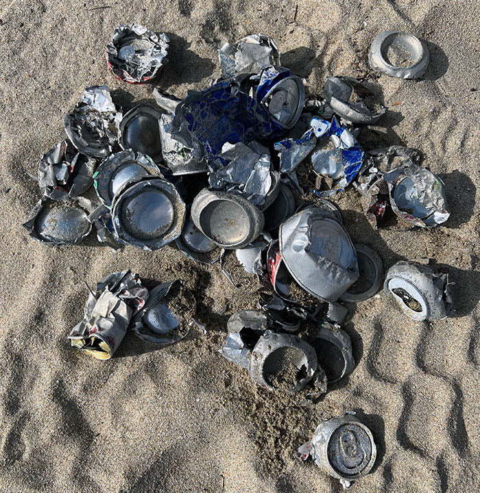Some jerk buried shrapnel all over my local beach. Tried to find as much as I could. Probably still a bunch more buried.