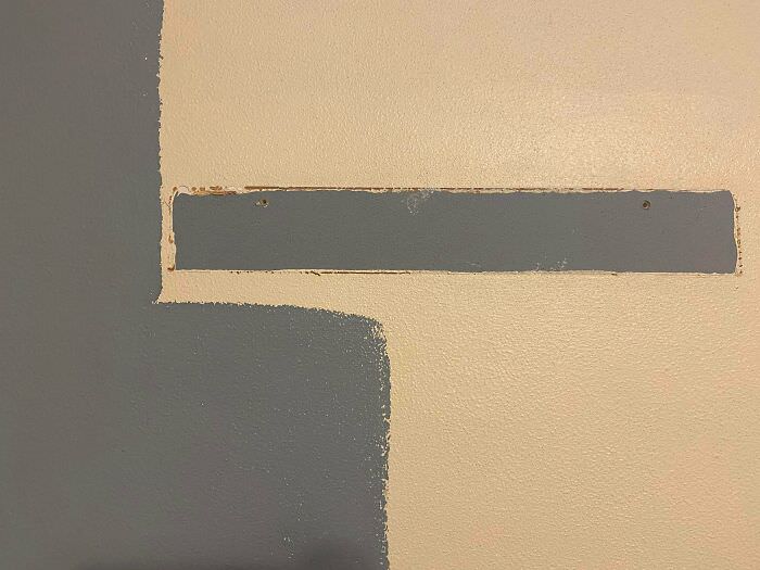 Removed a wall fixture that came with the house to repaint the wall and realized this room used to be this exact color. Old color in the middle, new paint on the left edge.