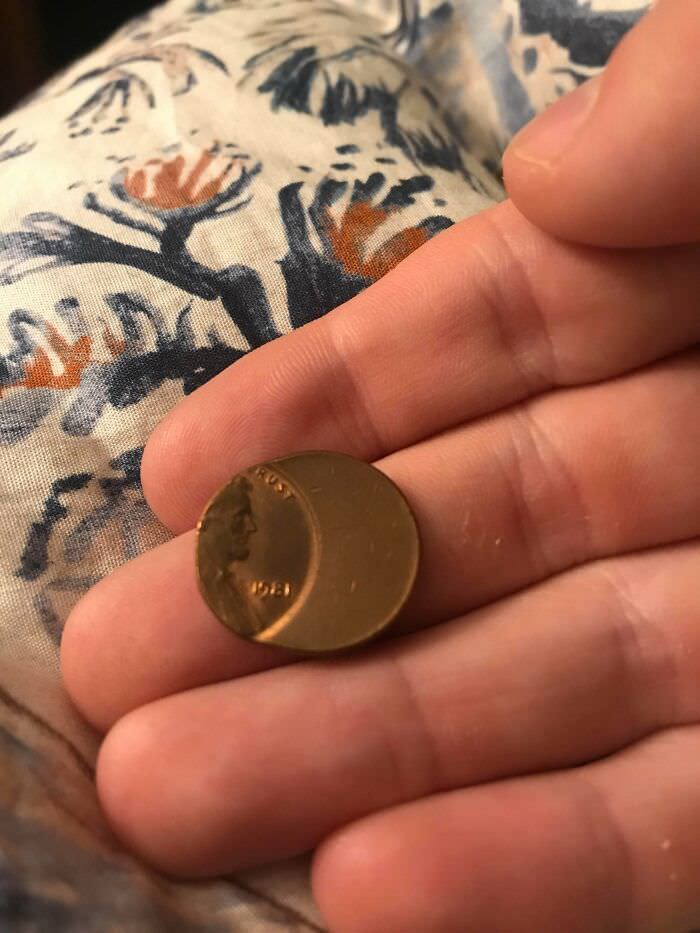 The machine that made this penny must’ve missed the coin face by a bit.