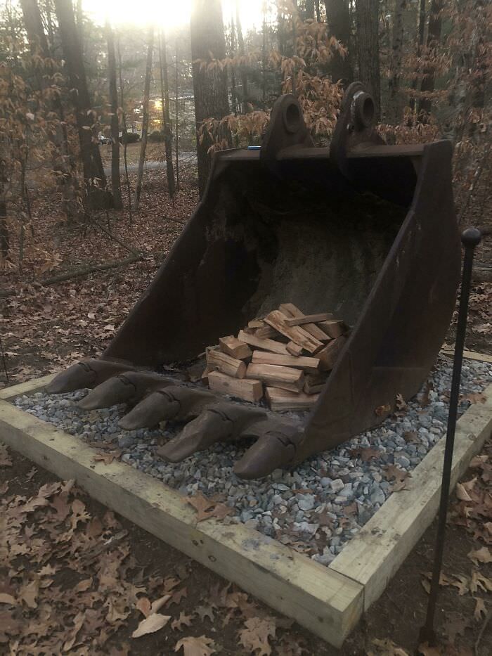 My dad’s new fire pit is a 60-inch excavating bucket.