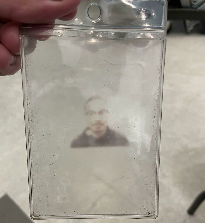 My work ID has been in its plastic holder for so long that it's imprinted this ghostly image of my face.