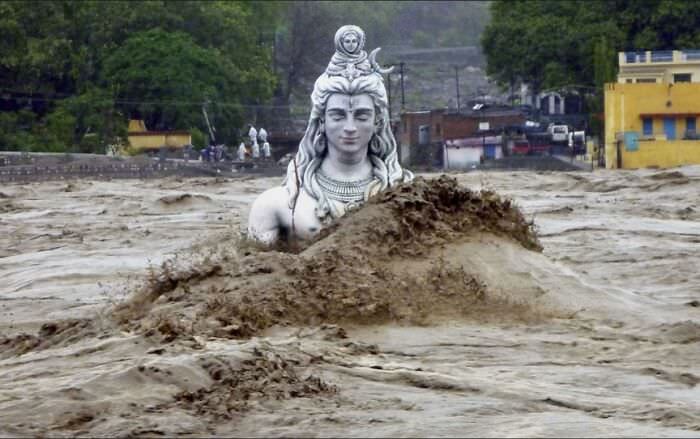 Partially submerged statue of Shiva the Destroyer during the flash flood in Uttarakhand.