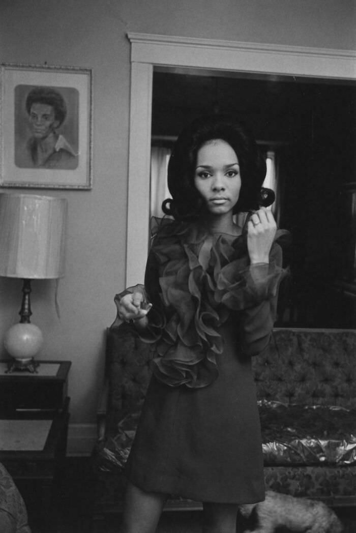 Young woman dressed for an evening out, Detroit, 1968.