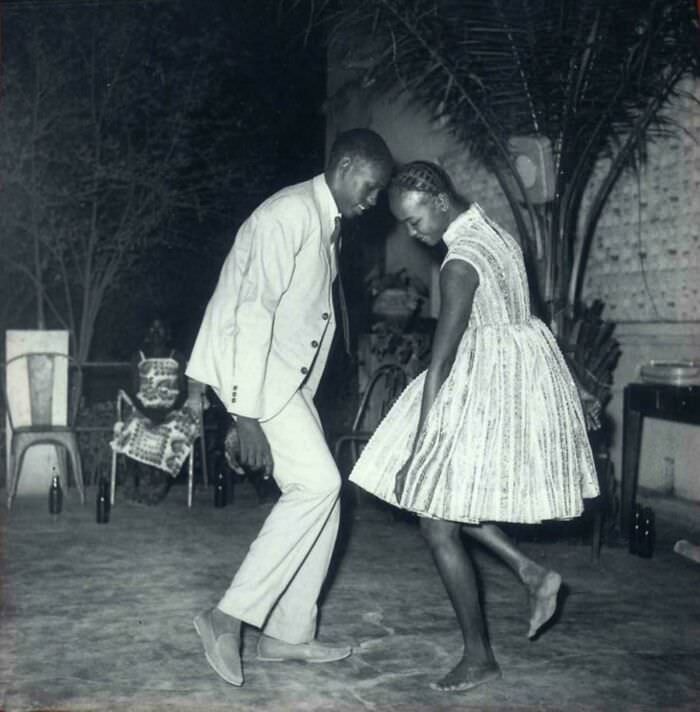 Young couple at a club in Mali. Photo by Malick Sidibé, Dec. 24, 1963.
