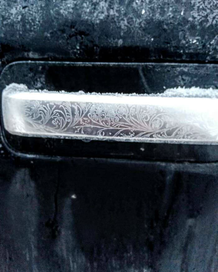 Truck door handle on a frosty morning.