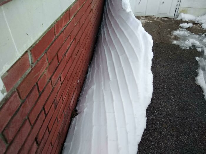The way the snow started to peel off this wall.