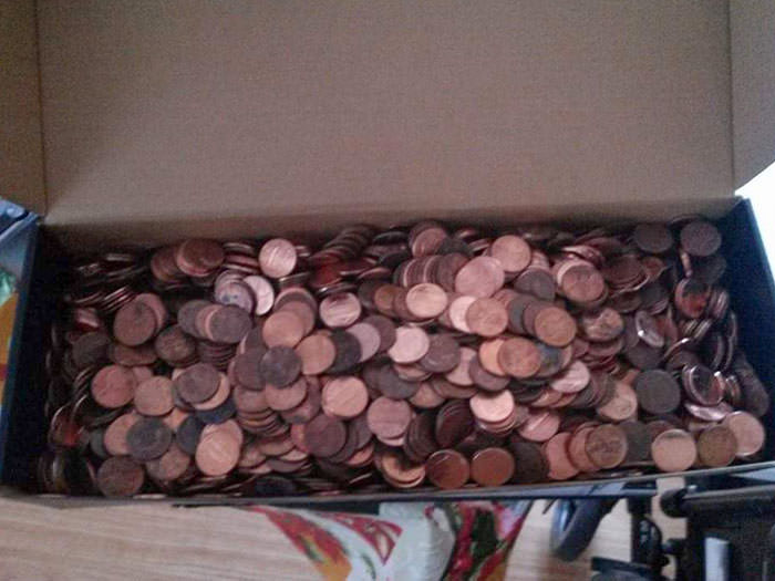 I asked my nephew what he wanted for Christmas. His only answer was money. I unwrapped 60 rolls of pennies into the box.