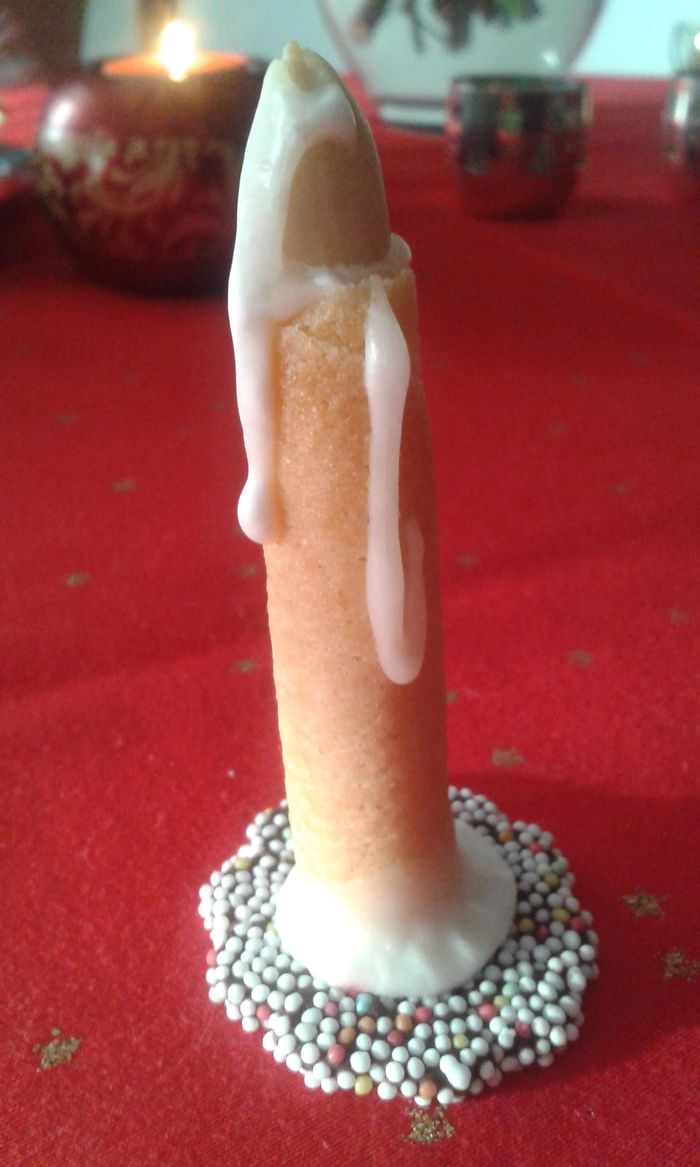 My grandma proudly presented her Christmas cookies that look like a candle.