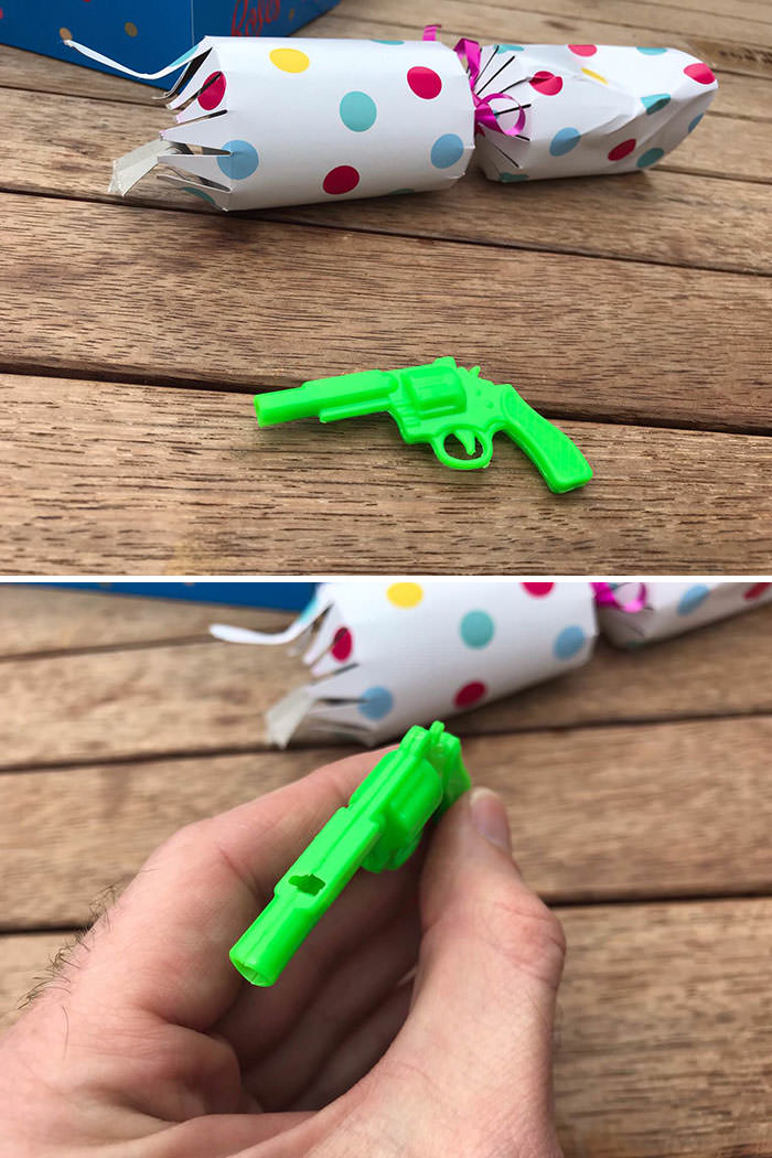 The cracker I got at my work’s Christmas lunch was a gun-shaped whistle. To blow it, you have to put the barrel in your mouth.