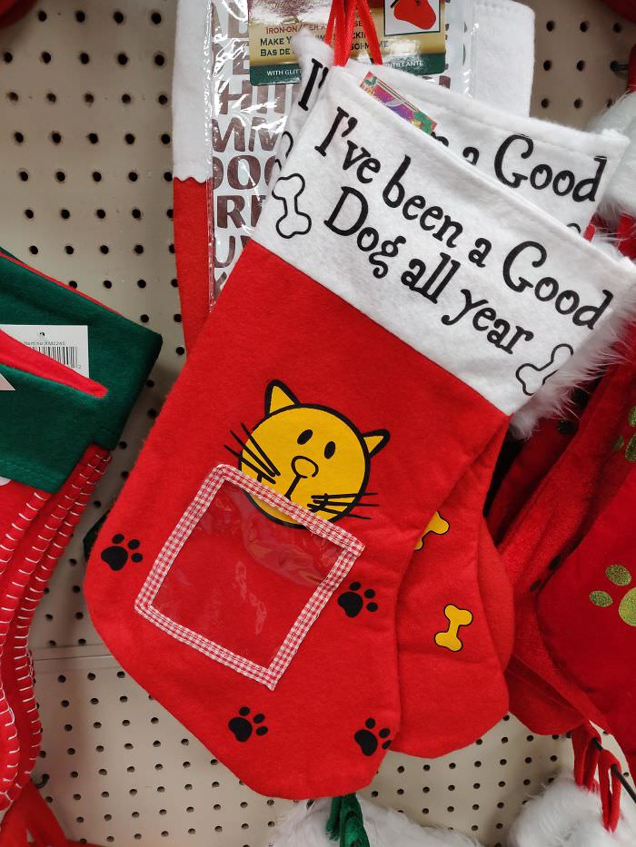 This Christmas stocking for your dog has a picture of a cat on it.