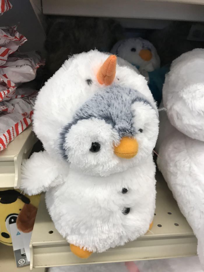 Snowman devouring a penguin.
