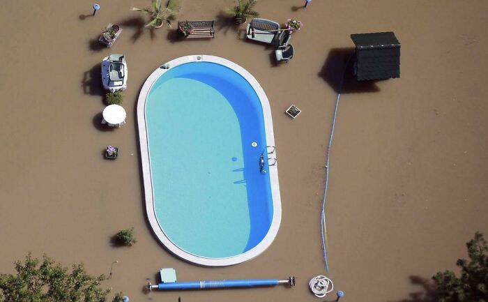 A pool untouched by the brown floodwaters.