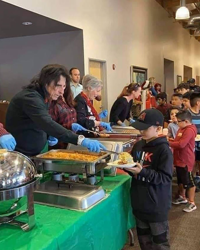 Every Christmas, Alice Cooper serves hundreds of in-need children free meals at his restaurant.